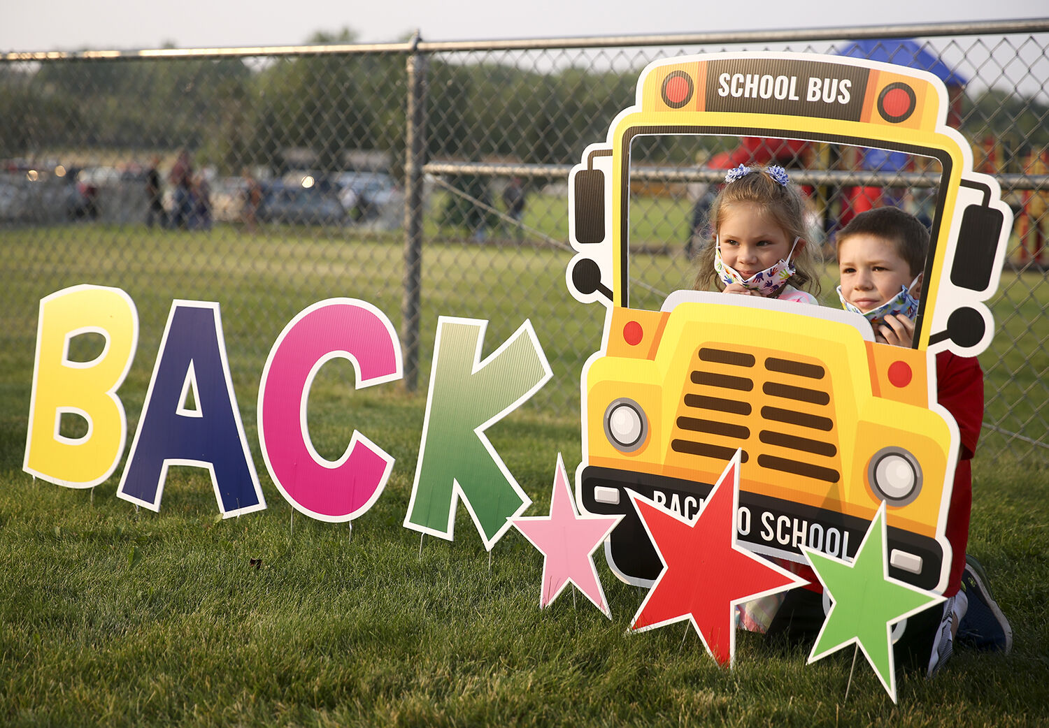 Rowan, 6, and Donnie Terzich, 7, pose for a first day of school photo